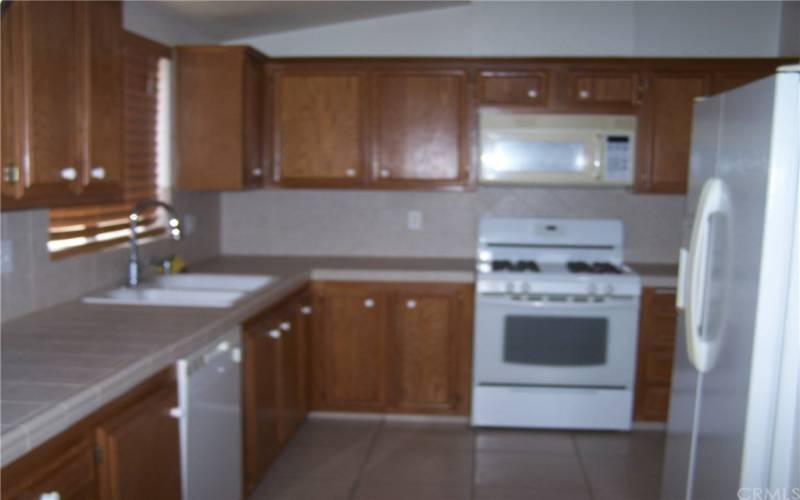 Great kitchen with plenty of cabinet space .