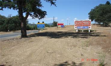 Signage at East entrance to property with Hwy 29 on the left.
