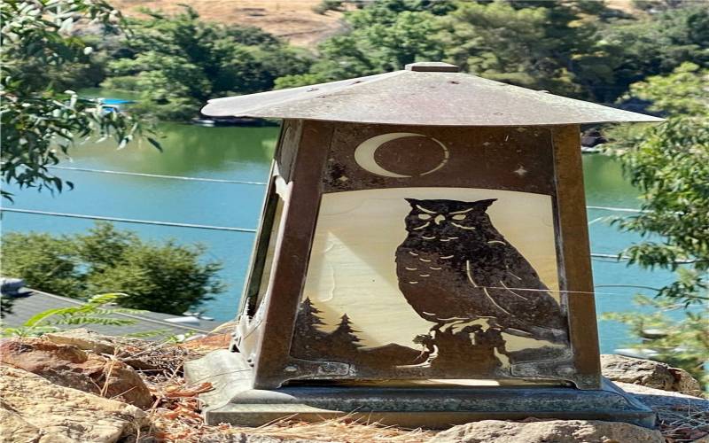 Art deco owl lamp with lake view