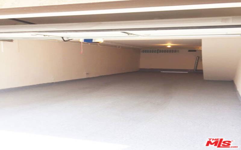 large spacious private garage with direct entry into the unit