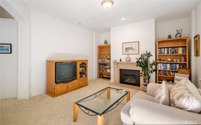 The retreat has a gas insert fireplace with stunning marble surround.