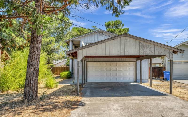 Nice carport!  Front door is to the left.