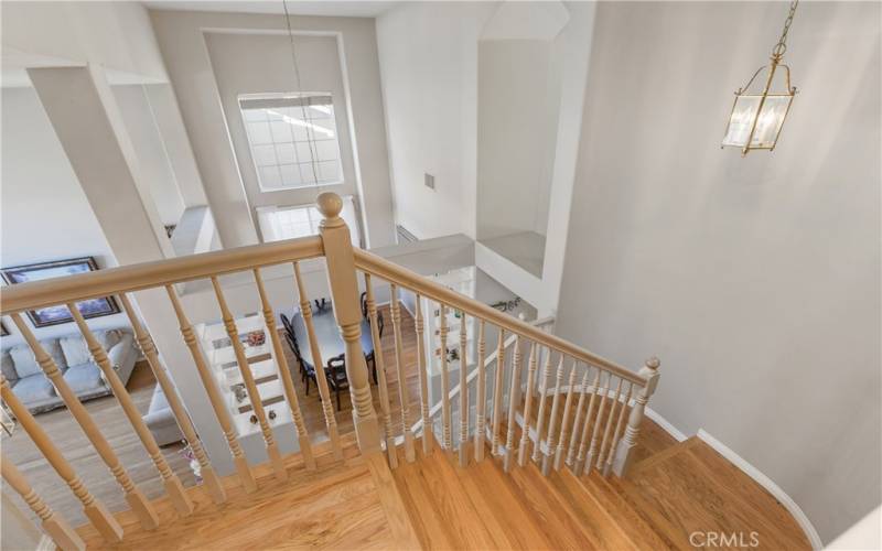 Heading upstairs. Notice the oak wood flooring on the staircase. You also have lovely views of the living room and dining room from the top landing.