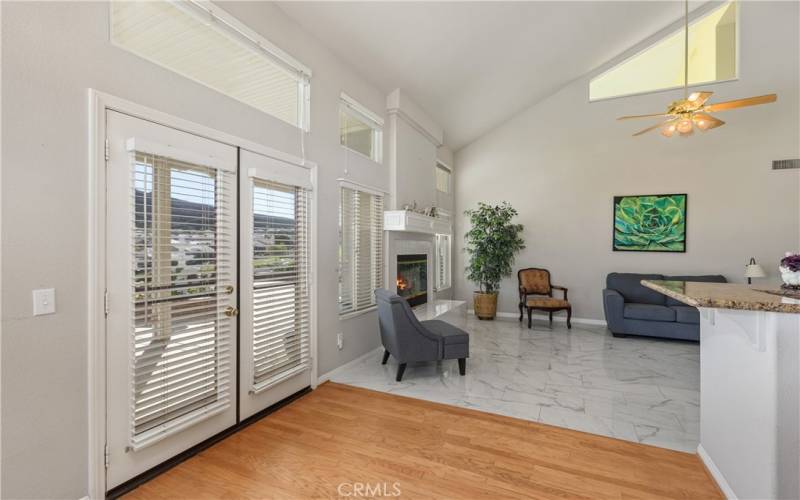 Looking back to the family room from the kitchen. Notice the bar counter to the right.