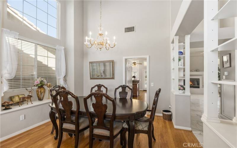 The dining room also has plenty of natural light from the windows.