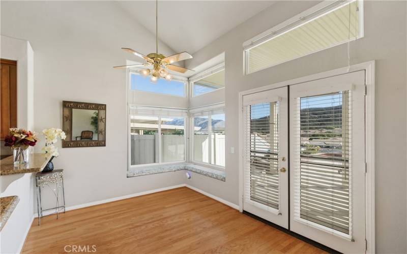 This kitchenette area has room for a small breakfast table. There are also cushions on the corner window so you can sit and enjoy the views.