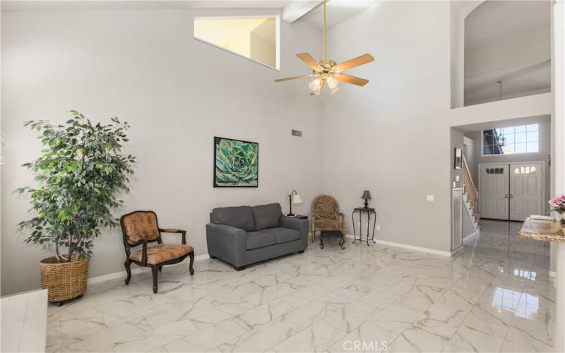 This view shows the family room's access to the front entry and living areas.