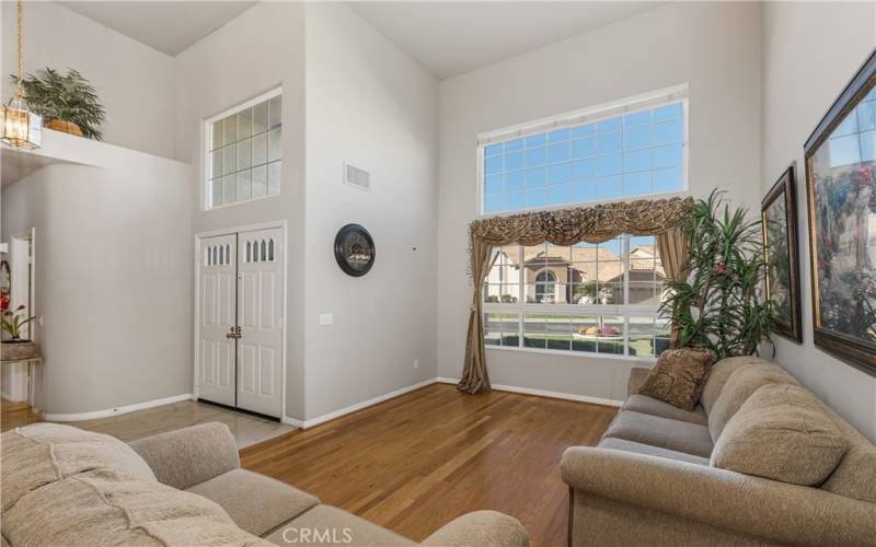 The double front doors lead to the entry which has marble tile flooring. The living room and dining rooms both feature oak wood floors.