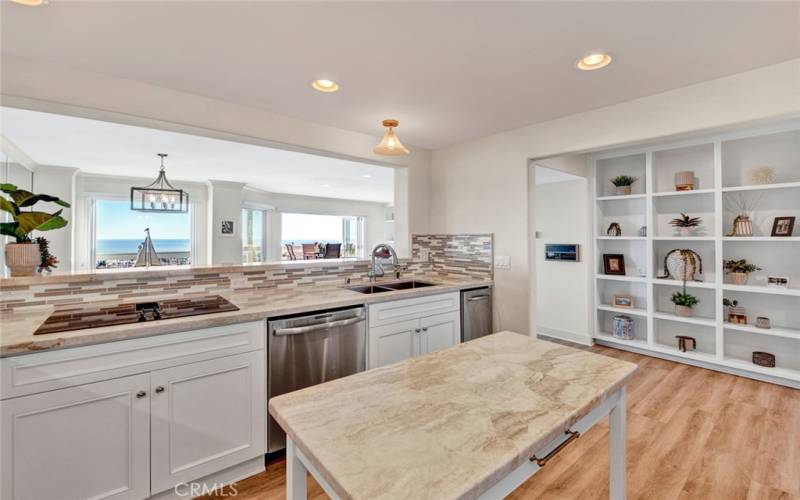Ocean view from newly renovated kitchen with stainless steel appliances.