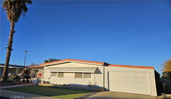 House with garage & awnings