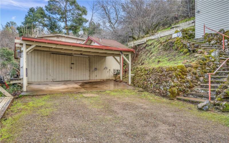 Carport and garage building at driveway