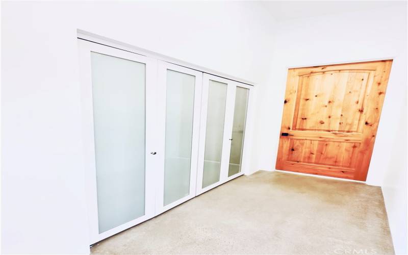 Hallway with laundry closet