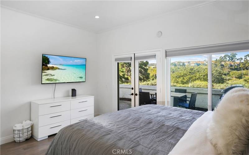 Master Bedroom looks out to golf course and​​‌​​​​‌​​‌‌​​‌​​​‌‌​​​‌​​‌‌​​‌‌​​‌‌​​​​ patio