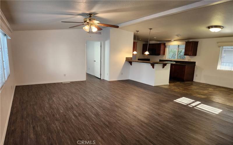 Walk way into your own private Master Suite on the other end of the home. away from the other bedrooms.

Master bedroom 1 Entry. Picture walking through your family room and kitchen. High vaulted ceilings and a fan