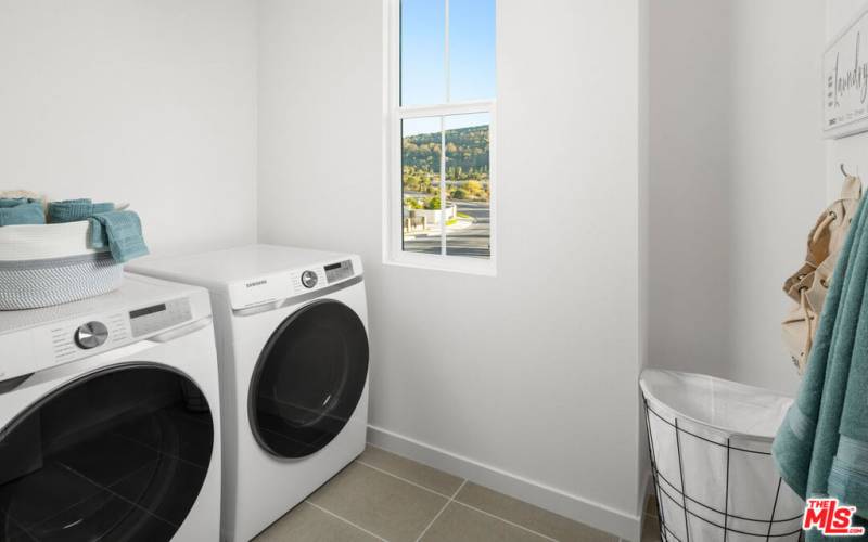 Model home laundry room. Used for representational purposes only.