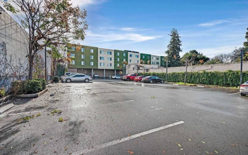 Parking lot toward rear of building