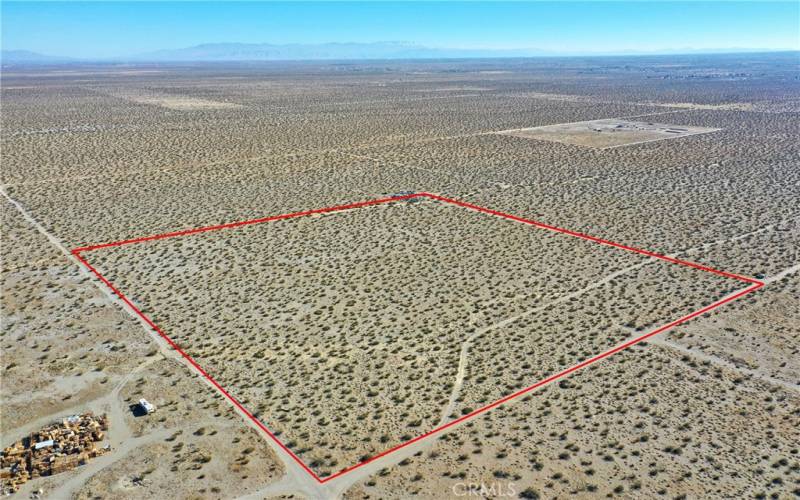 Red property boundary markers are not to be relied on as exact property lines. Buyer to confirm independently.