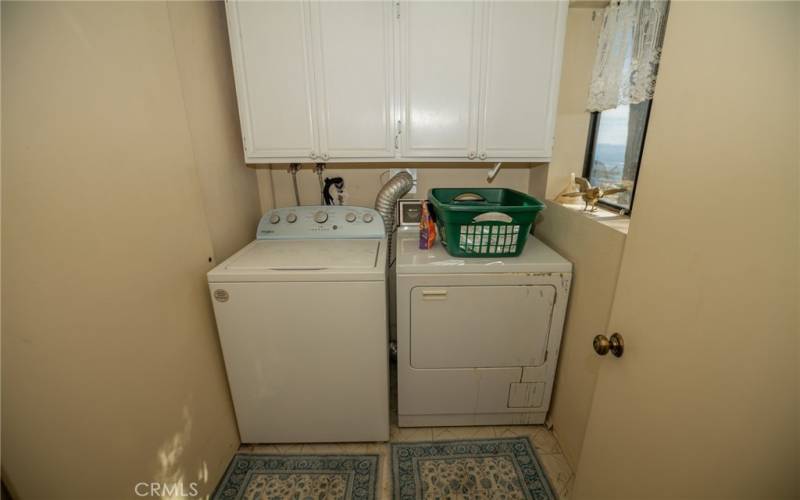 Laundry room with washer & dryer.