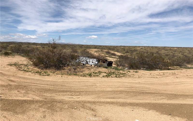 This is the burned out car where you make the left going down to Floreate.