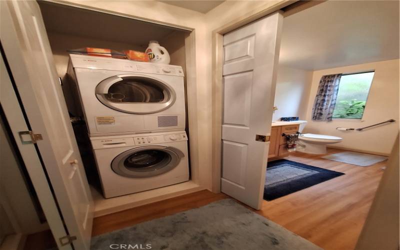Inside laundry located just off the master bedroom and bath.