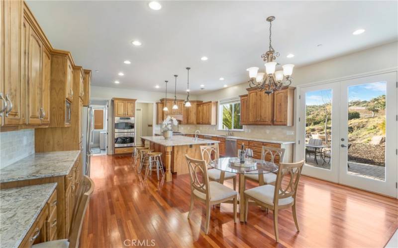 Fantastically upgraded kitchen stainless steel appliances, gourmet kitchen and island with walk in pantry mud room.