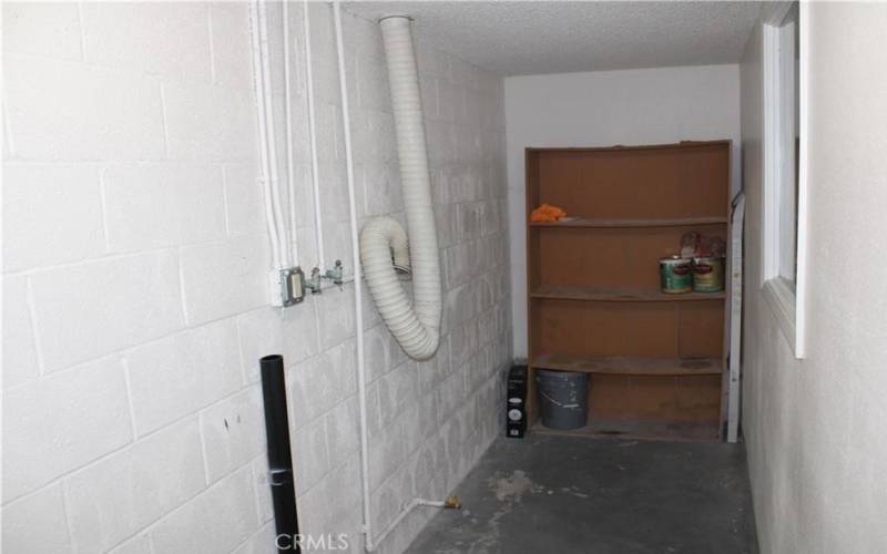 private storage room with washer/dryer hook up
