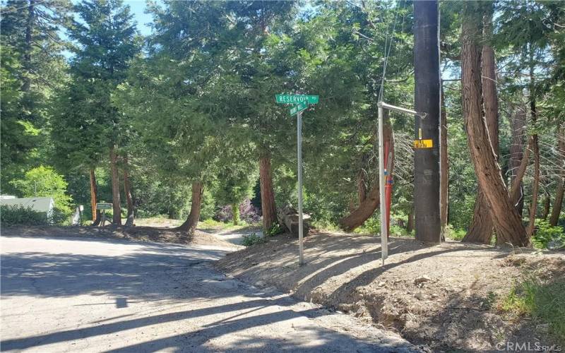 Take Burnt Mill Canyon to Reservoir, Reservoir is actually El Valle.  You will see my sign on the property on the right hand side.  Turn right at Reservoir.