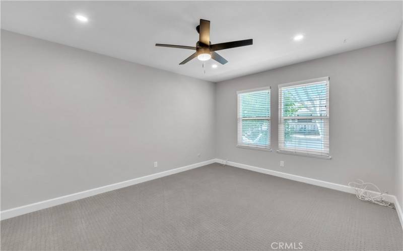 Spacious Primary Bedroom includes New Ceiling Fan and New Recessed Lighting.