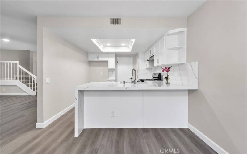 Beautifully Remodeled Kitchen includes a Breakfast Bar in addition to the Dining Area.