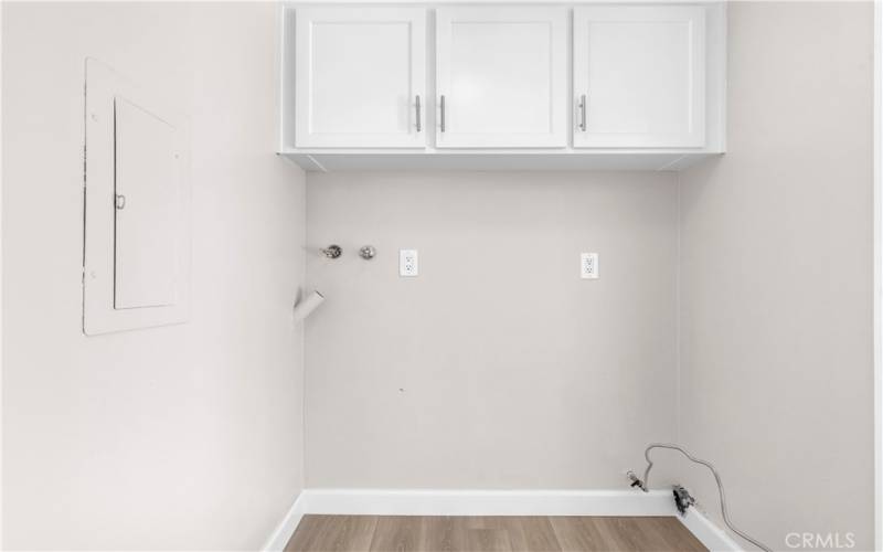 Full Size Private Interior Laundry Room with Storage Cabinets