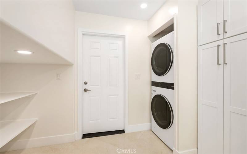 LG Wash-Tower in Kitchen and a Set of Washer /Dryer Upstairs!
