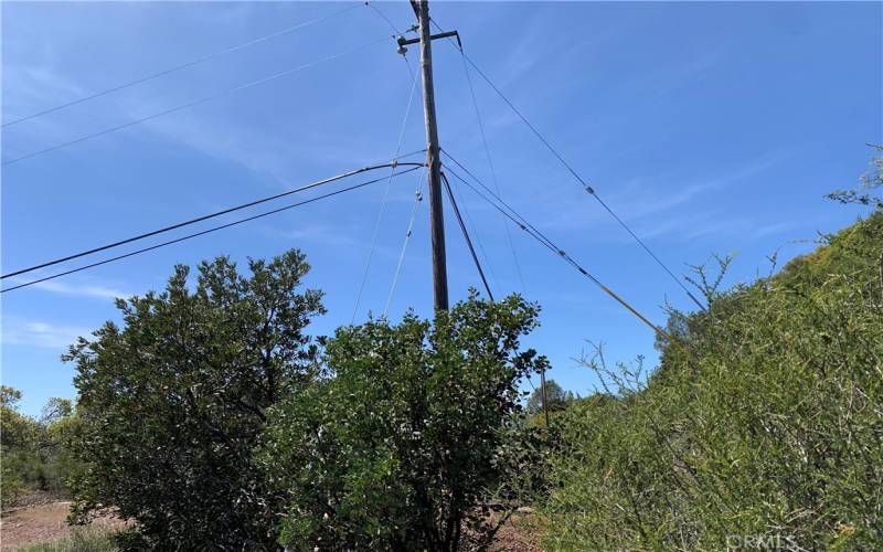 Power Pole/Lines located on the upper Northwest Corner of the property