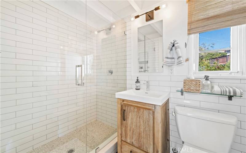 Remodeled bath with subway tiles