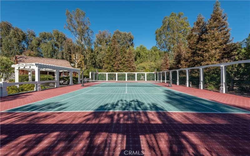 Tennis court above the spa and wellness center