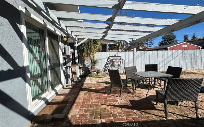 Front house view of sliding door from bedroom