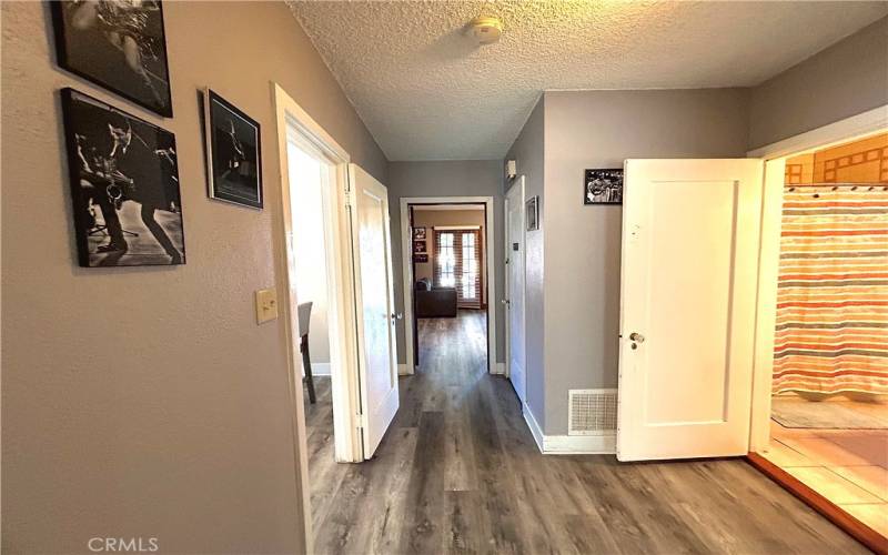 Front House Hallway from rooms to living room/kitchen