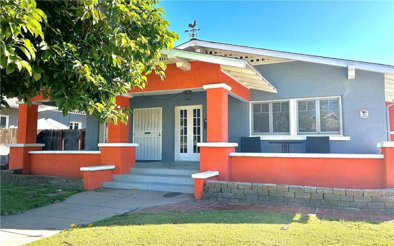 Front House with Large Avocado Tree