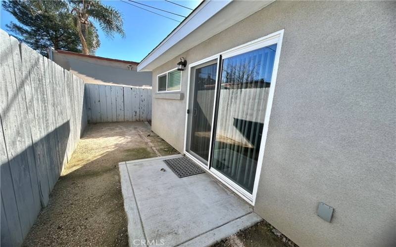 ADU - Side yard with sliding door from living room