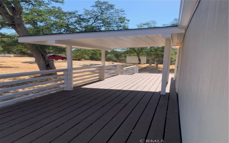 PARTIAL COVERED DECK OF HOME.