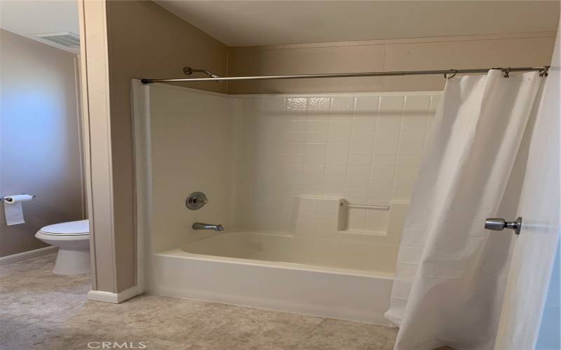 TUB IN SHOWER BATHROOM