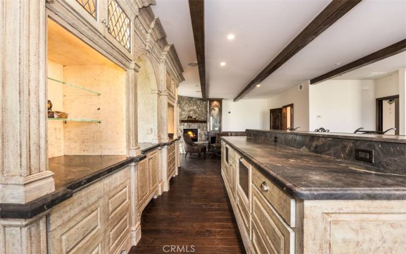 Kitchen offers horned granite countertops, a full kitchen, bar top with seating for 4-6 with a rage eating area.