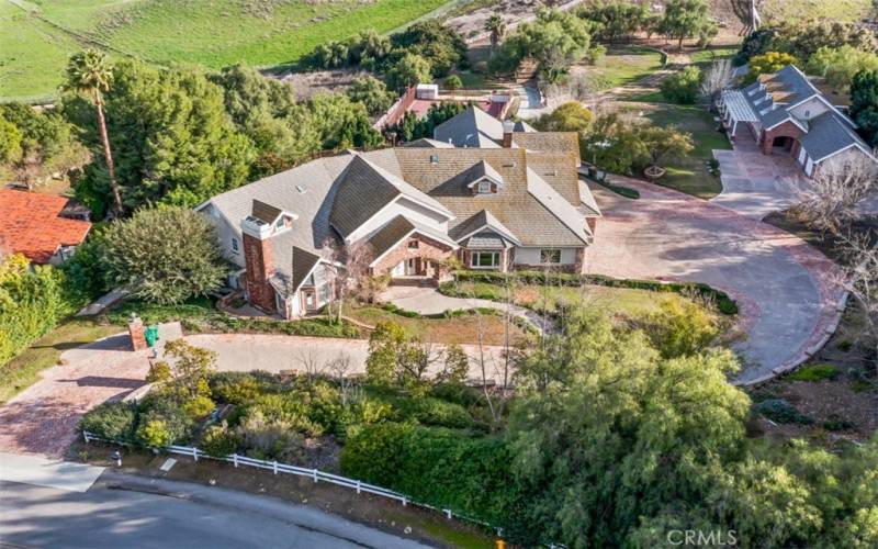 Sought-after Diamond Bar Hills Estate! This Two Parcel, 3.86 custom estate located in the prestigious, Country Estates is one of a kind.
