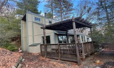 Home facing south with large deck