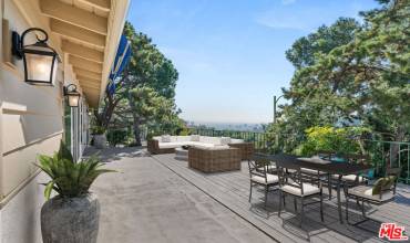 Expansive deck with city and ocean views-virtually staged