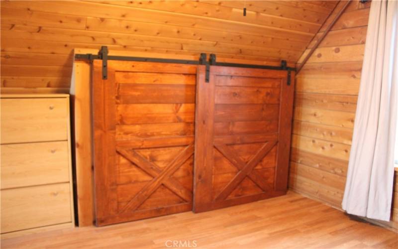 Loft bedroom- sliding barn door style