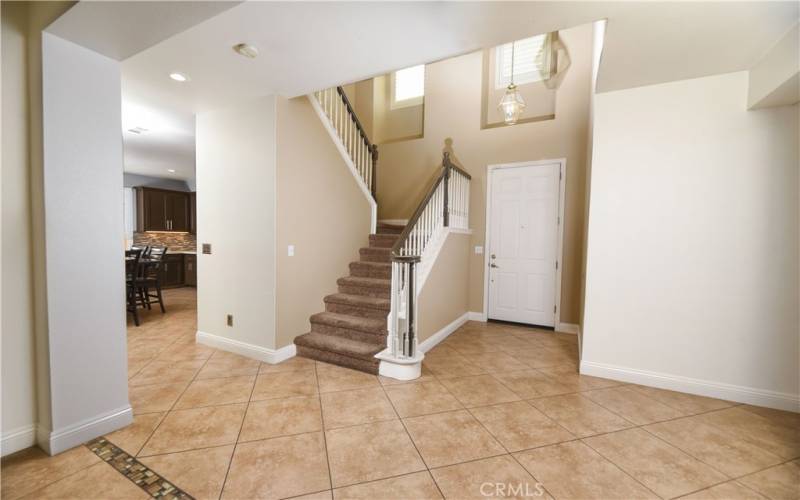 stairway to upstairs bedrooms and laundry