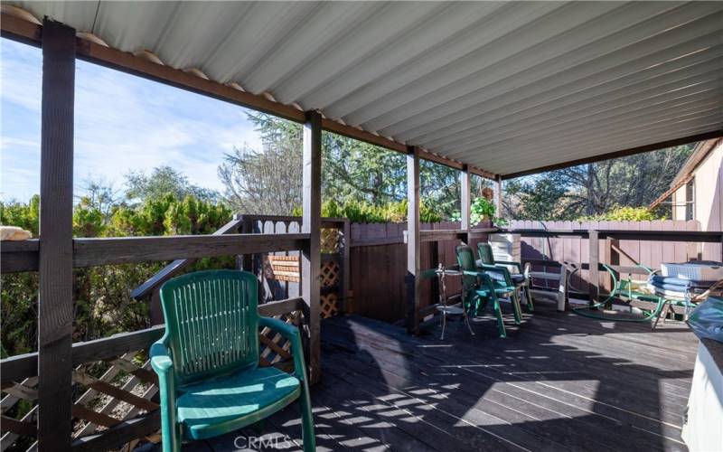Covered Porch with pet friendly area.