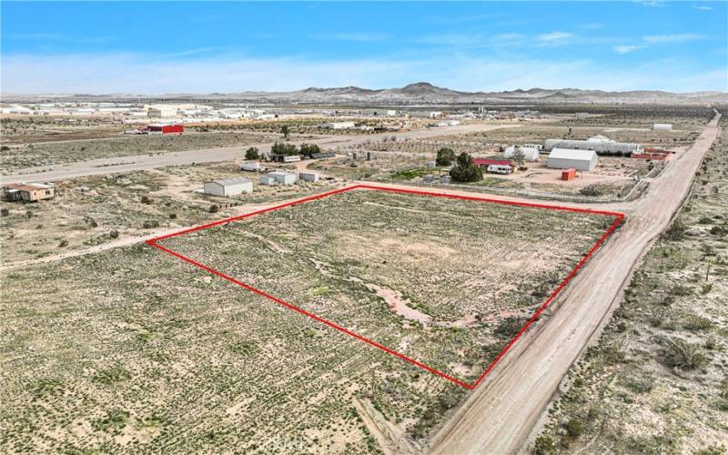 Red property boundary markers are not to be relied on as exact property lines. Buyer to confirm independently.