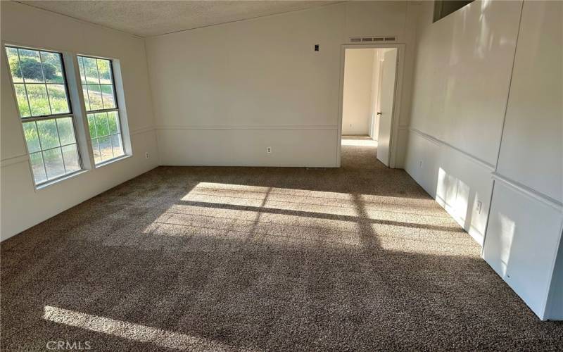 Newly installed carpet in living room.