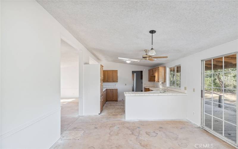 Open Kitchen with natural light.  Photo taken prior to new carpet being installed!